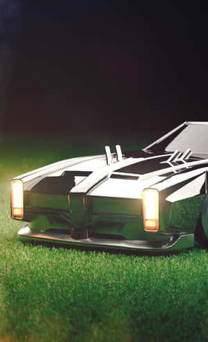 夜間停在草地上的未來主義汽車，帶有發光車頭燈。 — 火箭 GIF 壁紙