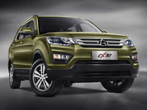 橄欖綠色CX70 SUV，在工作室環境中帶有鍍鉻細節。 — 天際線 壁紙