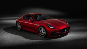 紅色Maserati跑車在攝影棚中帶有聚光燈效果 — 酷車 壁紙