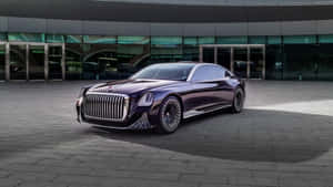 紫色豪華轎車停在現代玻璃建築前。 — 酷車 壁紙