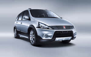 銀色SUV，黑色飾條和合金輪圈，攝影棚燈光 — 酷車 壁紙