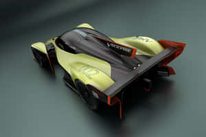 青檸綠和黑色帶紅色點綴的 Aston Martin Valkyrie 賽車。 — MacBook Pro 14 壁紙