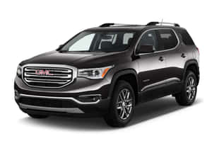 黑色GMC Acadia SUV在工作室環境中帶有鍍鉻格柵和合金輪圈。 — MacBook Air M4 壁紙