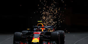 紅牛F1賽車在夜間疾馳，後輪火花四濺。 — 賽車 壁紙