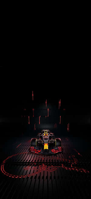 紅牛F1賽車在深色地板上被紅色霓虹燈照亮。 — Huawei 壁紙
