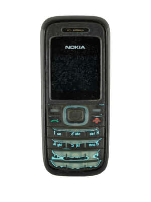 一部復古黑色 Nokia 手機，螢幕破裂，藍色鍵盤按鍵發光。 — Nokia 壁紙