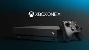 黑色 Xbox One X 主機和控制器，深藍色漸變背景。 — 4K 遊戲 壁紙