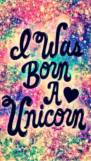 彩色宇宙閃粉背景上的文字「I Was Born A Unicorn」。
