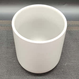 灰色紋理墊子上的白色陶瓷杯 — 1:1 壁紙