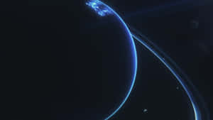 深空中一顆帶有發光環系統的藍色行星。 — 行星 壁紙