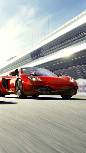 紅色跑車在明亮的陽光下於賽道上疾馳。 — 4K 法拉利 壁紙