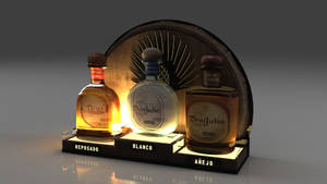 三瓶標有 reposado blanco 和 añejo 標籤的 Don Julio 龍舌蘭酒在木桶背景的燈光展示架上。