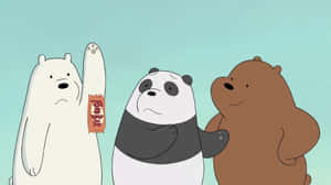 三隻卡通熊站在一起，其中一隻拿著Pop Bar包裝紙。 — 三隻熊 壁紙