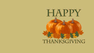 三個南瓜和秋葉，帶有「Happy Thanksgiving」文字。