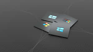 四張帶有 Microsoft Windows 標誌的黑色卡片，背景為深色網格。