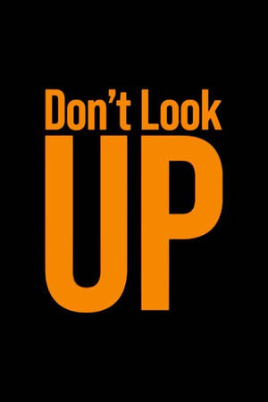 黑色背景上寫著「Don't Look UP」的粗體橙色文字。 — 橙色美學 壁紙