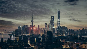 上海黃昏天際線，燈火通明的摩天大樓與江面倒影 — 唐人街 GIF 壁紙