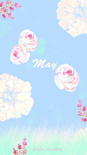 粉彩水彩花朵漂浮在草地上方，帶有「May」字樣。