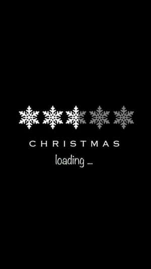 黑色背景上「Christmas loading」字樣上方的五片雪花。 — 聖誕老人 壁紙
