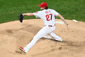 棒球投手在比賽中於土丘上投球中 — 棒球 壁紙