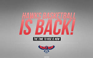Hawks 籃球隊標語圖形，帶有紅色文字和標誌，位於灰色背景上。 — 阿特蘭大鷹隊 壁紙