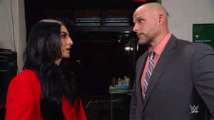 兩個摔角手喺WWE活動後台對峙。 — WWE GIF 壁紙