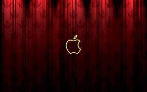 紅色圖案窗簾上嘅發光Apple標誌