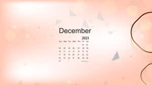 2023年12月月曆，柔和蜜桃色背景上帶有幾何形狀。