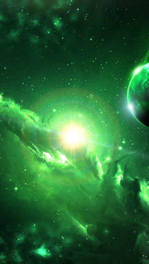 深空中一團充滿活力的綠色星雲，有一顆發光的恆星和一顆繞行的行星。 — 銀河 壁紙