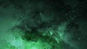 深邃太空中帶有星星的鮮綠色星雲
