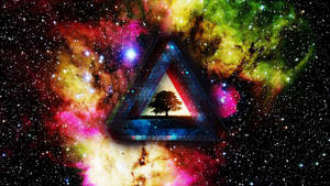 太空中的發光三角形框住一棵孤獨的樹，背景是色彩繽紛的星雲。 — 美學手機GIF 壁紙