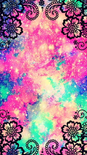 宇宙星雲，閃爍的星星被黑色花卉和佩斯利圖案框住，採用霓虹色。 — 型格動態圖 壁紙