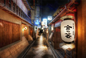 夜晚狹窄的日本小巷，被發光的燈籠和霓虹燈照亮。