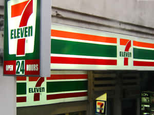7 Eleven店舖招牌，紅、綠、白條紋，24小時營業