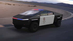 未來感警車在黃昏的沙漠賽道上疾馳。 — Tesla GIF 壁紙