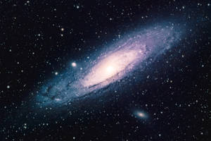 一個螺旋星系，具有明亮的核心和充滿恆星和宇宙塵埃的旋轉臂。