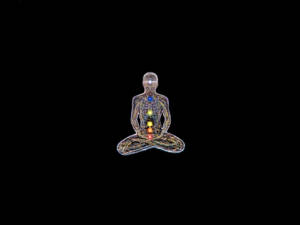 線框人體在黑色背景上冥想，帶有發光脈輪