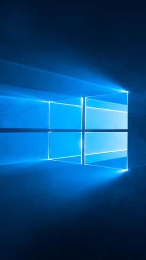 一個發光的藍色Windows標誌在黑暗空間中散發光芒。
