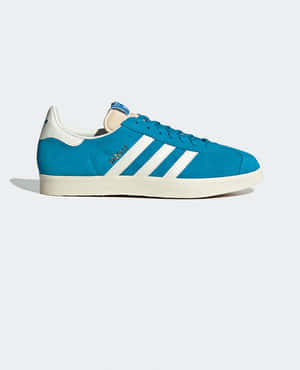 藍色 adidas Gazelle 運動鞋，帶有白色條紋和鞋帶，在純色背景上。 — Adidas GIF 壁紙