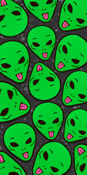 綠色卡通外星人伸出粉紅色舌頭，形成重複圖案。