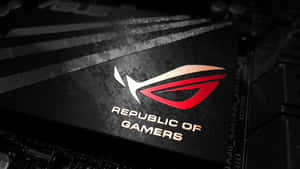 帶有紅色和白色照明的遊戲主機板上的 ASUS ROG Republic of Gamers 標誌。 — 玩家國度 壁紙