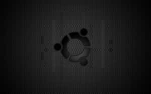 深色六角形網格背景上的 Ubuntu 標誌