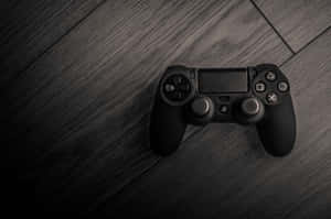 深色木質表面上的黑色遊戲手掣