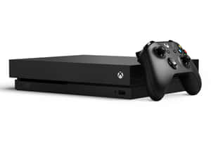 黑色 Xbox 主機和控制器在白色背景上