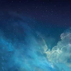 在深空星場下發光的鮮豔藍色和青色星雲。