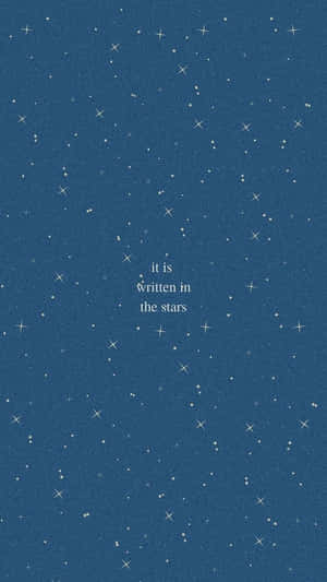 深藍色星空，白色文字 it is written in the stars。 — 藍色 iPhone 壁紙