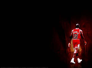 一名身穿紅色球衣的籃球運動員從鏡頭前走開。 — 科比· Bryant 壁紙