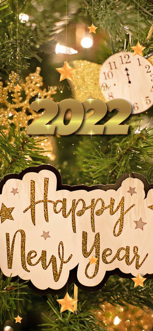 2022年節日新年裝飾，帶有金色文字和松樹枝。