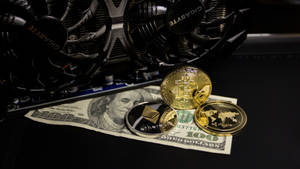 一百美元鈔票上的加密貨幣硬幣和顯示卡。 — 加密貨幣 壁紙