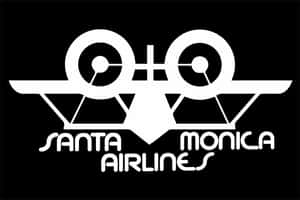黑色背景上白色的雙螺旋槳設計 Santa Monica Airlines 標誌。